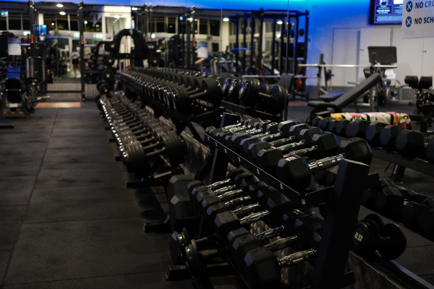 Dumbbell racks running down the strength floor at NoosaFit 24-7
