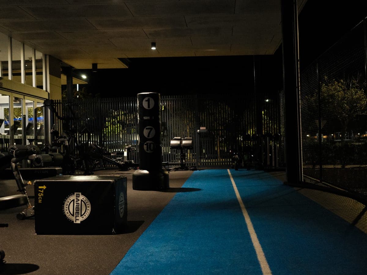 Sled track and plyo boxes in the outdoor under-roof training zone